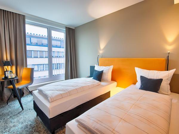 LOGINN Hotel Leipzig : photo 4 de la chambre chambre simple affaires