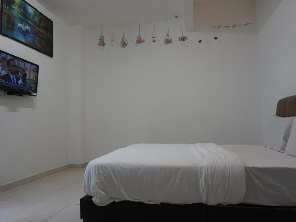 S & S Guest House Kuantan : photo 6 de la chambre chambre standard lit queen-size