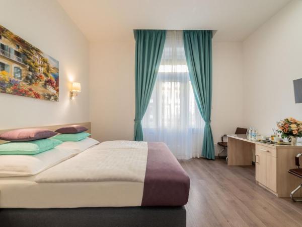 Global Suites Budapest : photo 5 de la chambre chambre double ou lits jumeaux deluxe avec balcon