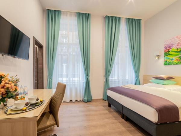 Global Suites Budapest : photo 1 de la chambre chambre deluxe double ou lits jumeaux