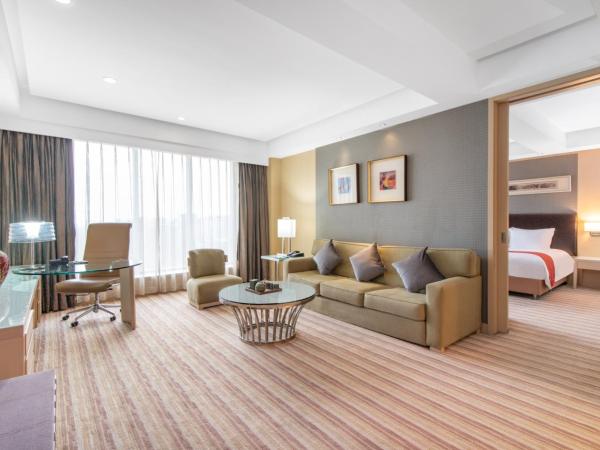 Qingdao Parkview Holiday Hotel : photo 2 de la chambre suite exécutive