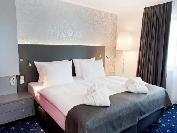 Holiday Inn Dresden - City South, an IHG Hotel : photo 7 de la chambre chambre lit king-size exécutive