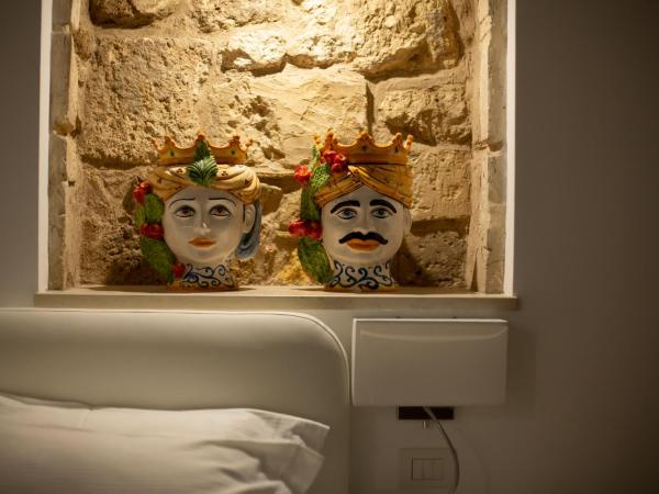 Vento di Sicilia : photo 1 de la chambre chambre lit king-size avec balcon