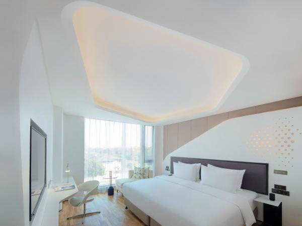 FlyZoo Hotel - Alibaba Future Hotel : photo 4 de la chambre hébergement deluxe hollywood lit king-size