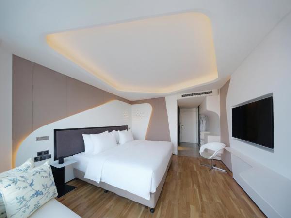 FlyZoo Hotel - Alibaba Future Hotel : photo 5 de la chambre hébergement deluxe hollywood lit king-size