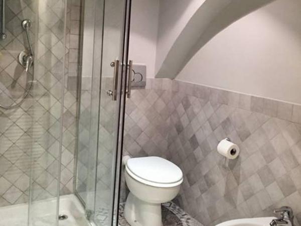 Chiossone Suites : photo 1 de la chambre chambre quadruple avec salle de bains privative