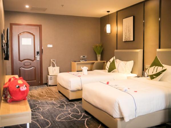 Guangzhou Homies Hotel : photo 3 de la chambre chambre lits jumeaux deluxe