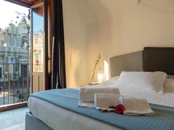 Le Suites Del Duomo House : photo 9 de la chambre chambre triple avec balcon