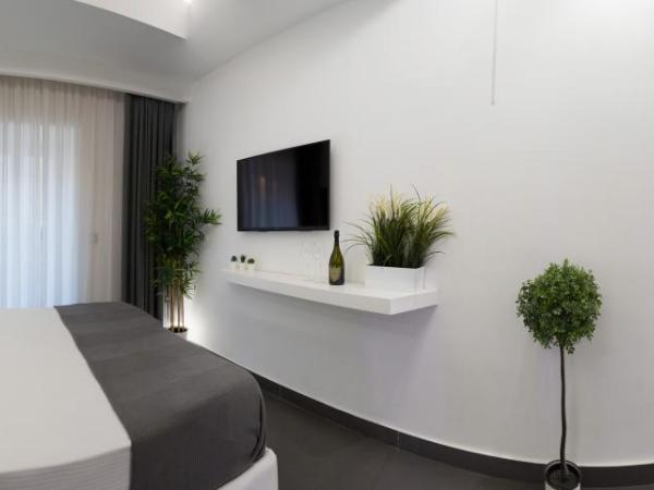 Le Suites Del Duomo : photo 1 de la chambre chambre lit queen-size avec baignoire spa