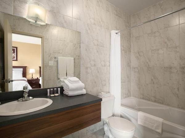 Days Inn by Wyndham Montreal East : photo 1 de la chambre chambre avec 2 lits doubles - non-fumeurs