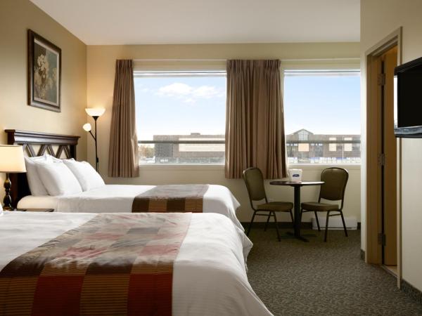 Days Inn by Wyndham Montreal East : photo 5 de la chambre chambre avec 2 lits doubles - non-fumeurs