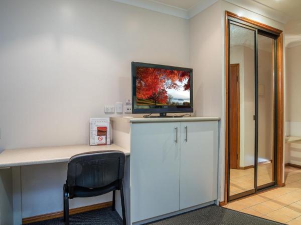 Aspley Carsel Motor Inn : photo 5 de la chambre chambre lits jumeaux de luxe avec cuisine