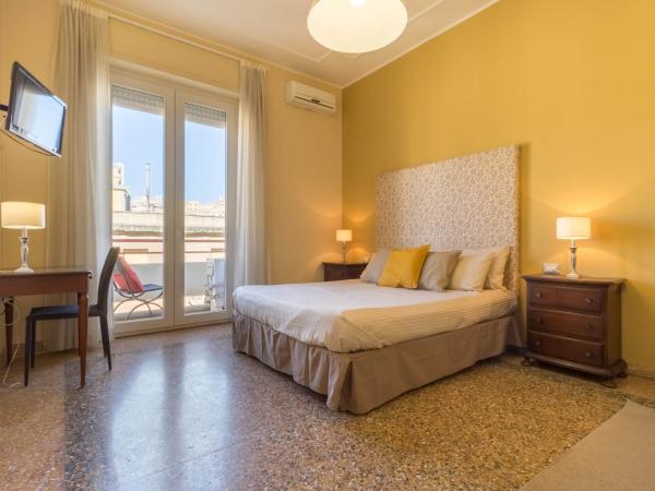 Al Porto Di Cagliari : photo 2 de la chambre grande chambre double ou lits jumeaux