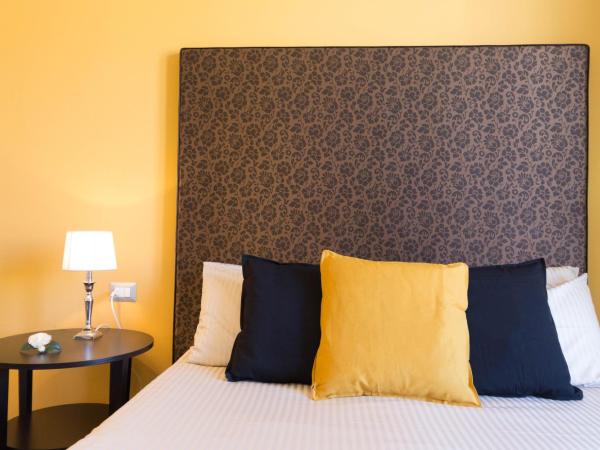 Al Porto Di Cagliari : photo 4 de la chambre chambre deluxe double ou lits jumeaux