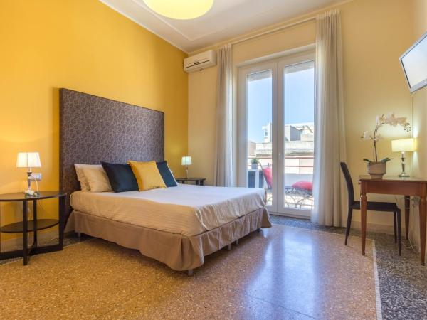 Al Porto Di Cagliari : photo 5 de la chambre chambre deluxe double ou lits jumeaux