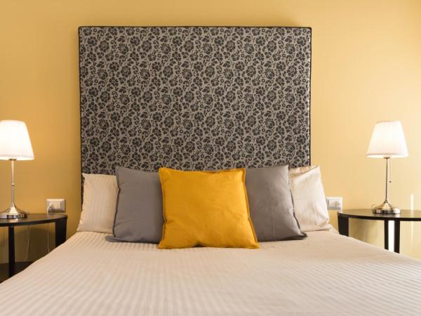 Al Porto Di Cagliari : photo 4 de la chambre grande chambre double ou lits jumeaux