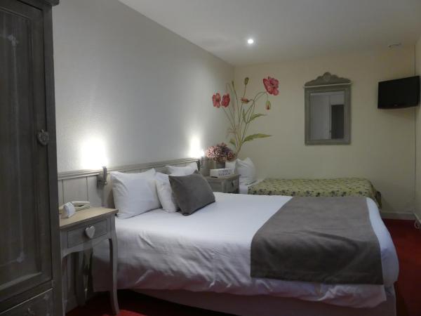 Hôtel Aux Tamaris - Vue Mer : photo 3 de la chambre chambre double standard - vue sur ville - croisière