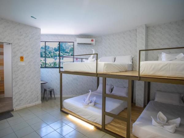Lazy Cat Home At Gaya Street : photo 7 de la chambre chambre familiale avec salle de bains privative
