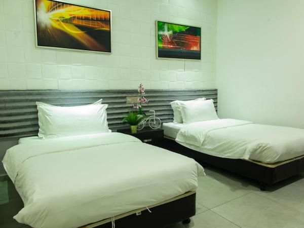 M Design Hotel @ Shamelin Perkasa : photo 6 de la chambre chambre lits jumeaux deluxe