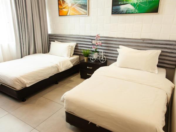 M Design Hotel @ Shamelin Perkasa : photo 7 de la chambre chambre lits jumeaux deluxe