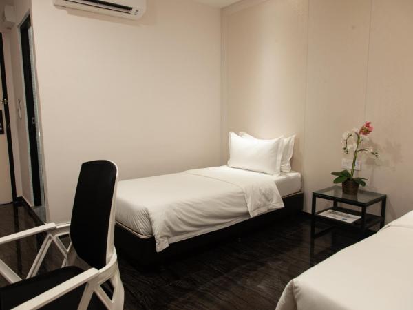 M Design Hotel @ Taman Pertama : photo 1 de la chambre chambre lits jumeaux supérieure