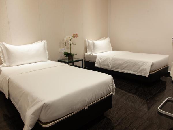 M Design Hotel @ Taman Pertama : photo 2 de la chambre chambre lits jumeaux supérieure
