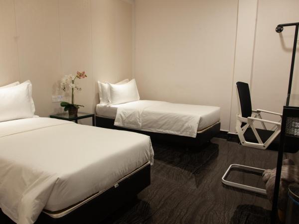 M Design Hotel @ Taman Pertama : photo 3 de la chambre chambre lits jumeaux supérieure