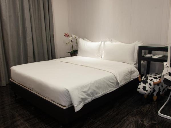 M Design Hotel @ Taman Pertama : photo 1 de la chambre chambre lit queen-size deluxe