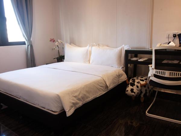 M Design Hotel @ Taman Pertama : photo 2 de la chambre chambre lit queen-size deluxe
