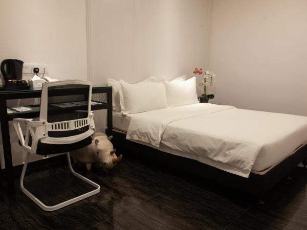 M Design Hotel @ Taman Pertama : photo 1 de la chambre chambre lit queen-size