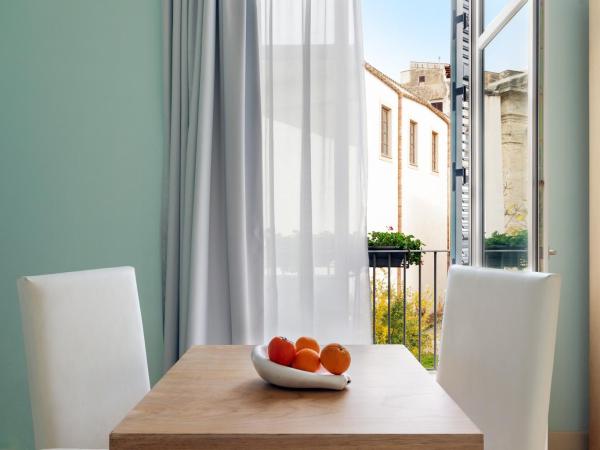 Palazzo Brunaccini Boutique Hotel : photo 6 de la chambre chambre supérieure avec lit à baldaquin