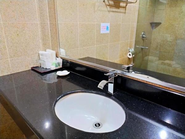 TD Plaza Hotel : photo 6 de la chambre chambre triple deluxe