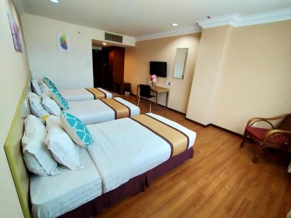 TD Plaza Hotel : photo 3 de la chambre chambre triple deluxe