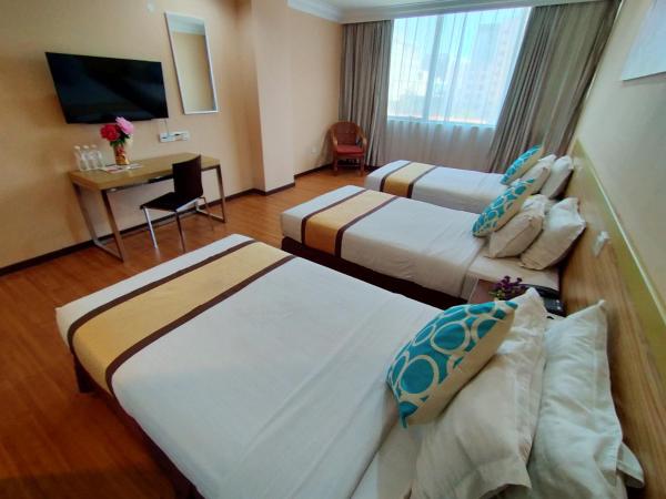 TD Plaza Hotel : photo 2 de la chambre chambre triple deluxe