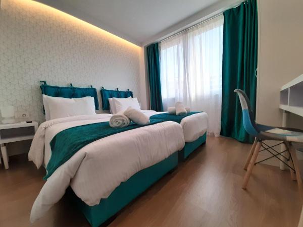 Athenian Montaza Hotel : photo 10 de la chambre chambre lits jumeaux