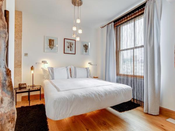 Hotel Una : photo 2 de la chambre jubba - suite lit king-size