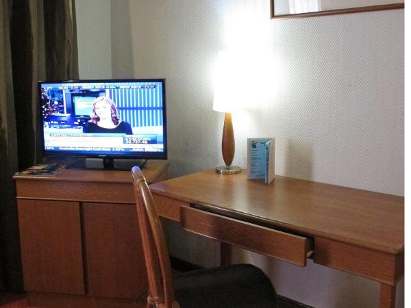 Hotel Grand Continental Kuching : photo 4 de la chambre chambre standard lit queen-size