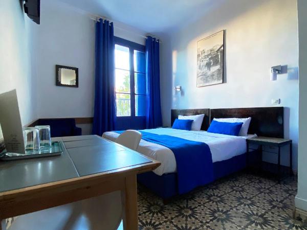 Hôtel Central : photo 2 de la chambre chambre lits jumeaux