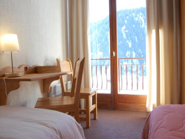 Le Roitelet : photo 8 de la chambre chambre triple supérieure avec balcon