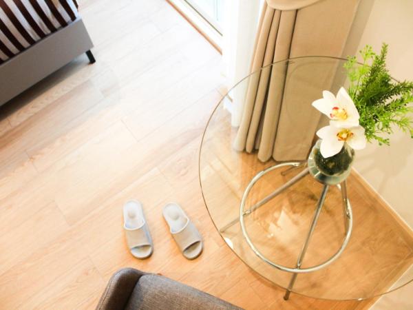 The Square 101 : photo 2 de la chambre chambre double deluxe avec balcon