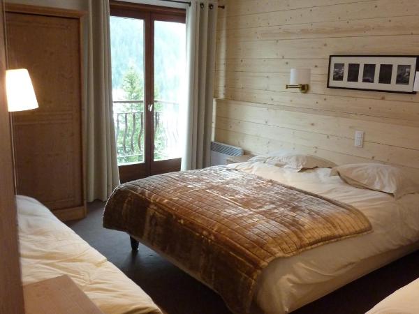 Le Roitelet : photo 8 de la chambre chambre quadruple supérieure avec balcon