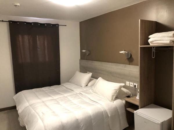 Hôtel de Ménilmontant : photo 2 de la chambre chambre lits jumeaux avec salle de bains privative