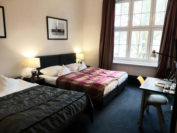 Hotel Wagner im Dammtorpalais : photo 1 de la chambre chambre triple