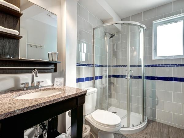 Auberge St. Jacques : photo 5 de la chambre chambre lit queen-size avec baignoire spa