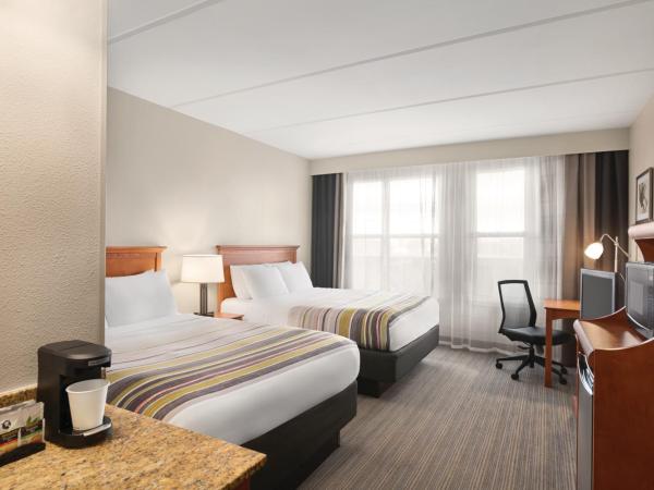 Country Inn & Suites by Radisson, Orlando Airport, FL : photo 1 de la chambre chambre avec 2 grands lits queen-size 