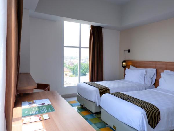 KHAS Tugu Hotel Yogyakarta : photo 3 de la chambre chambre lits jumeaux de luxe avec vue panoramique