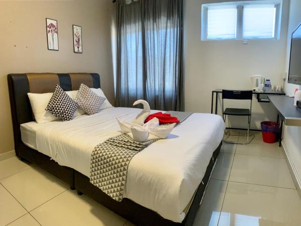 Pengkalan Dua : photo 2 de la chambre chambre lit queen-size deluxe