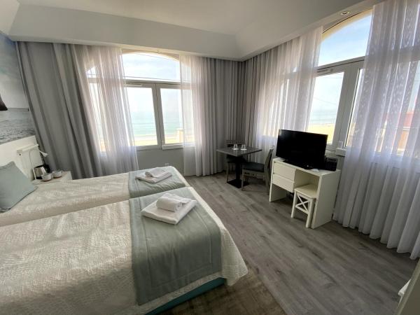 Golden Beach Guest House & Rooftop Bar : photo 8 de la chambre chambre lits jumeaux premium - vue sur mer