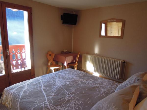 Le Roitelet : photo 9 de la chambre chambre triple supérieure avec balcon