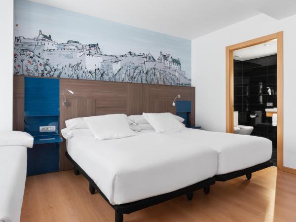 Eurostars Blue Coruña : photo 4 de la chambre chambre lits jumeaux supérieure avec lit d'appoint